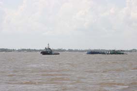 A Small Tug Passing