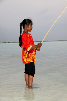 Just after, she caught a fish - so happy!
