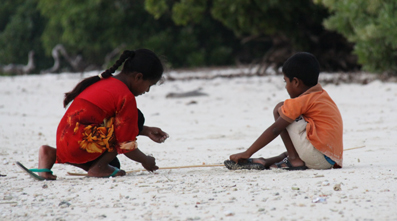 Kids on the Beach getting their fishing rod reday